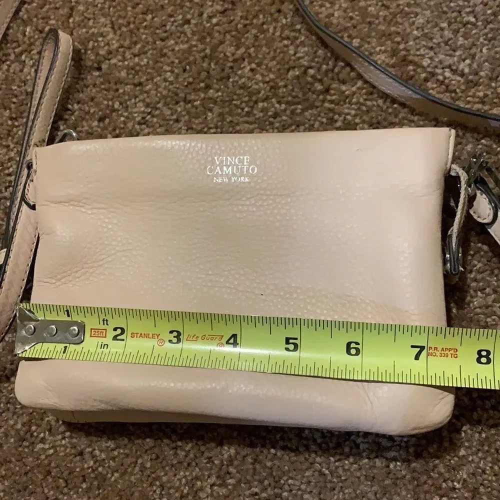 Vince Camuto soft pink crossbody wristlet.